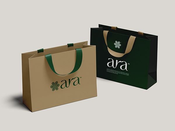 Aura Green and kraft shopping bags